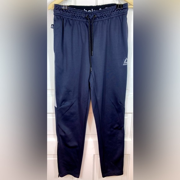Reebok Dark Gray Stretchy Soft Track Pants. 3 pockets.  Zippers at leg base. - Picture 3 of 13